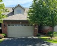 Beautiful three bedroom townhome in Cobblestone off Main and for sale in Munster Indiana Lake County County on GolfHomes.com