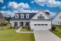 Built in 2022 in the sought-after Cape Fear National section of for sale in Leland North Carolina Brunswick County County on GolfHomes.com