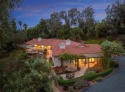 Nestled on a sprawling 2.9 acres, this stunning property boasts for sale in Rancho Santa Fe California San Diego County County on GolfHomes.com