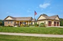 Welcome to your dream home nestled on a serene corner cul-de-sac for sale in Indianola Iowa Warren County County on GolfHomes.com