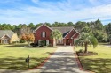 This spectacular custom built all brick 4 bed, 4.5 bath home for sale in Myrtle Beach South Carolina Horry County County on GolfHomes.com