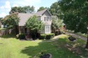 RIVER OAKS CHARMER with a beautiful in-ground pool area! Located for sale in Searcy Arkansas White County County on GolfHomes.com