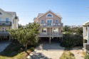 Nestled in the Village of Nags Head, this investment property or for sale in Nags Head North Carolina Dare County County on GolfHomes.com