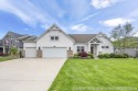 Welcome to the most incredible walk out ranch in sought after for sale in Holland Michigan Ottawa County County on GolfHomes.com