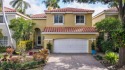 Look no further! Beautiful 2 story home located in the gated for sale in Hollywood Florida Broward County County on GolfHomes.com