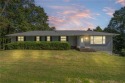Welcome home to this well-maintained split-level residence for sale in Bella Vista Arkansas Benton County County on GolfHomes.com