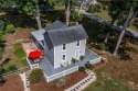 This Salt Box-inspired beauty, echoes the cozy charm of early for sale in Irvington Virginia Lancaster County County on GolfHomes.com