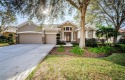 This exquisite 5-bedroom, 4-bathroom home, situated in the for sale in Valrico Florida Hillsborough County County on GolfHomes.com