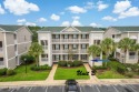 Don't Miss This First Floor - Golf  Pond View Condo in Sandpiper for sale in Sunset Beach North Carolina Brunswick County County on GolfHomes.com
