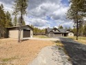 MOVE IN READY! Stunning custom home situated on 4.8 treed acres for sale in Rathdrum Idaho Kootenai County County on GolfHomes.com
