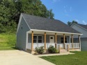 LOCATED WITHIN STEPS to PAINTSVILLE GOLF COURSE, you will find for sale in Paintsville Kentucky Johnson County County on GolfHomes.com