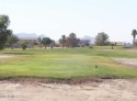 Mountain views on a golf course - this Arizona City lot is ready for sale in Arizona City Arizona Pinal County County on GolfHomes.com