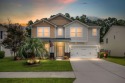 This stunning two-story home combines timeless Lowcountry charm for sale in Summerville South Carolina Berkeley County County on GolfHomes.com