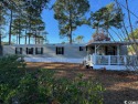 Embrace tranquility and scenic beauty at Crystal Lake! This for sale in Myrtle Beach South Carolina Horry County County on GolfHomes.com