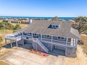 Welcome to your Outer Banks dream beach house! This exceptional for sale in Kitty Hawk North Carolina Dare County County on GolfHomes.com