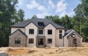 Welcome to a true masterpiece located in the prestigious Echelon for sale in Alpharetta Georgia Cherokee County County on GolfHomes.com