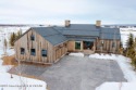 This Immaculate four bedroom cabin designed by Northworks for sale in Driggs Idaho Teton County County on GolfHomes.com