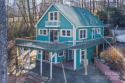 Welcome to this quaint cottage in the woods surrounded by nature for sale in Spruce Pine North Carolina Mitchell County County on GolfHomes.com