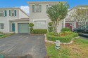 Welcome to your dream townhouse nestled in a serene and for sale in Tamarac Florida Broward County County on GolfHomes.com
