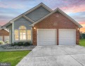 This charming brick and siding single-family home offers the for sale in Annapolis Maryland Anne Arundel County County on GolfHomes.com