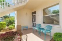 1st FLOOR, END UNIT, WITH STUNNING, EXPANSIVE VIEWS OF LAKE AND for sale in Estero Florida Lee County County on GolfHomes.com