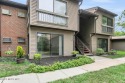 Set in a peaceful, tucked-away location within Shadow Lake for sale in Red Bank New Jersey Monmouth County County on GolfHomes.com