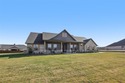 Experience timeless elegance in this beautifully crafted for sale in Granbury Texas Hood County County on GolfHomes.com