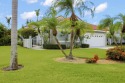 Located in the highly desirable Golf and Country Club Community for sale in Palm Beach Gardens Florida Palm Beach County County on GolfHomes.com