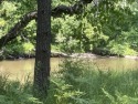 This remarkable 0.83 +/- acre wooded lot is a nature lover's for sale in Hillman Michigan Montmorency County County on GolfHomes.com