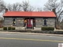 Located on Main Street in downtown Cadiz, KY, this quaint cabin for sale in Cadiz Kentucky Trigg County County on GolfHomes.com