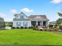 This stunning Creekside home offers front-row views of the for sale in Calabash North Carolina Brunswick County County on GolfHomes.com