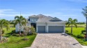 Indulge in this extraordinary Summerville home featuring 2400+ for sale in Punta Gorda Florida Charlotte County County on GolfHomes.com