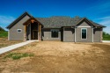 This beautifully crafted 3-bedroom, 2.5-bath home in the Powder for sale in Sheridan Wyoming Sheridan County County on GolfHomes.com