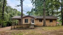 This updated home sits only a few blocks from Crown Lake Pier for sale in Horseshoe Bend Arkansas Izard County County on GolfHomes.com