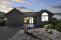 Discover peace, privacy, and panoramic beauty in this 3-bedroom for sale in Spokane Washington Spokane County County on GolfHomes.com