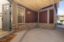 Enjoy sweeping mountain and golf course views from the covered for sale in Granby Colorado Grand County County on GolfHomes.com