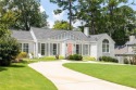 Beautifully updated and full of charm, this home is nestled in for sale in Atlanta Georgia Fulton County County on GolfHomes.com