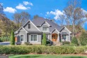 Nestled on the serene shores of Lake Lanier, this exquisite for sale in Gainesville Georgia Hall County County on GolfHomes.com