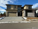 This former model home is a luxurious masterpiece of modern for sale in Windsor Colorado Weld County County on GolfHomes.com