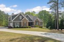 Welcome to your dream home in the highly sought-after gated for sale in Forsyth Georgia Monroe County County on GolfHomes.com