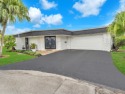 Spacious 3BR/2.5BA home in the prestigious Woodlands of Tamarac for sale in Tamarac Florida Broward County County on GolfHomes.com