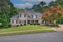 Entertainer's dream home. Gorgeous 3 side brick home in Towne for sale in Woodstock Georgia Cherokee County County on GolfHomes.com