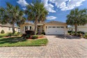 This stunning custom-designed home is a true showstopper, filled for sale in Oxford Florida Sumter County County on GolfHomes.com