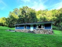 Beautiful Home Features 6.13 Acres of open field and forest for sale in Hinton West Virginia Summers County County on GolfHomes.com