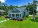 This nearly new residence is situated on a corner lot within the for sale in Southport North Carolina Brunswick County County on GolfHomes.com