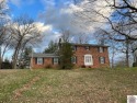Looking for a spacious home convenient to town?  This 2 story for sale in Cadiz Kentucky Trigg County County on GolfHomes.com