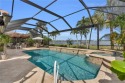 IMMEDIATE GOLF MEMBERSHIP! Escape to tropical serenity in the for sale in Naples Florida Collier County County on GolfHomes.com