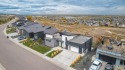 Welcome to this custom-built masterpiece overlooking panoramic for sale in Windsor Colorado Weld County County on GolfHomes.com