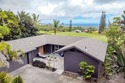 Discover the perfect blend of modern upgrades and island living for sale in Naalehu Hawaii Big Island County County on GolfHomes.com