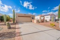 Don't miss this Charming and beautifully updated Santa Fe style for sale in Green Valley Arizona Pima County County on GolfHomes.com